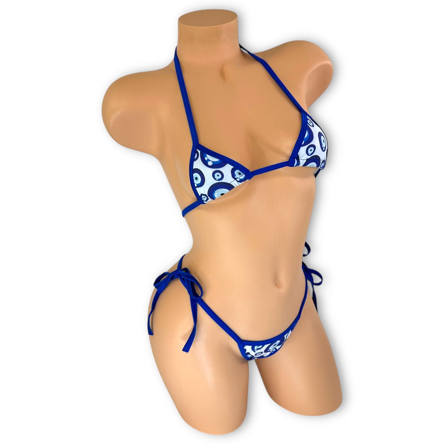 Evil eye pattern stripper outfit triangle top close-up — Golddiggers Boutique exotic dancewear
