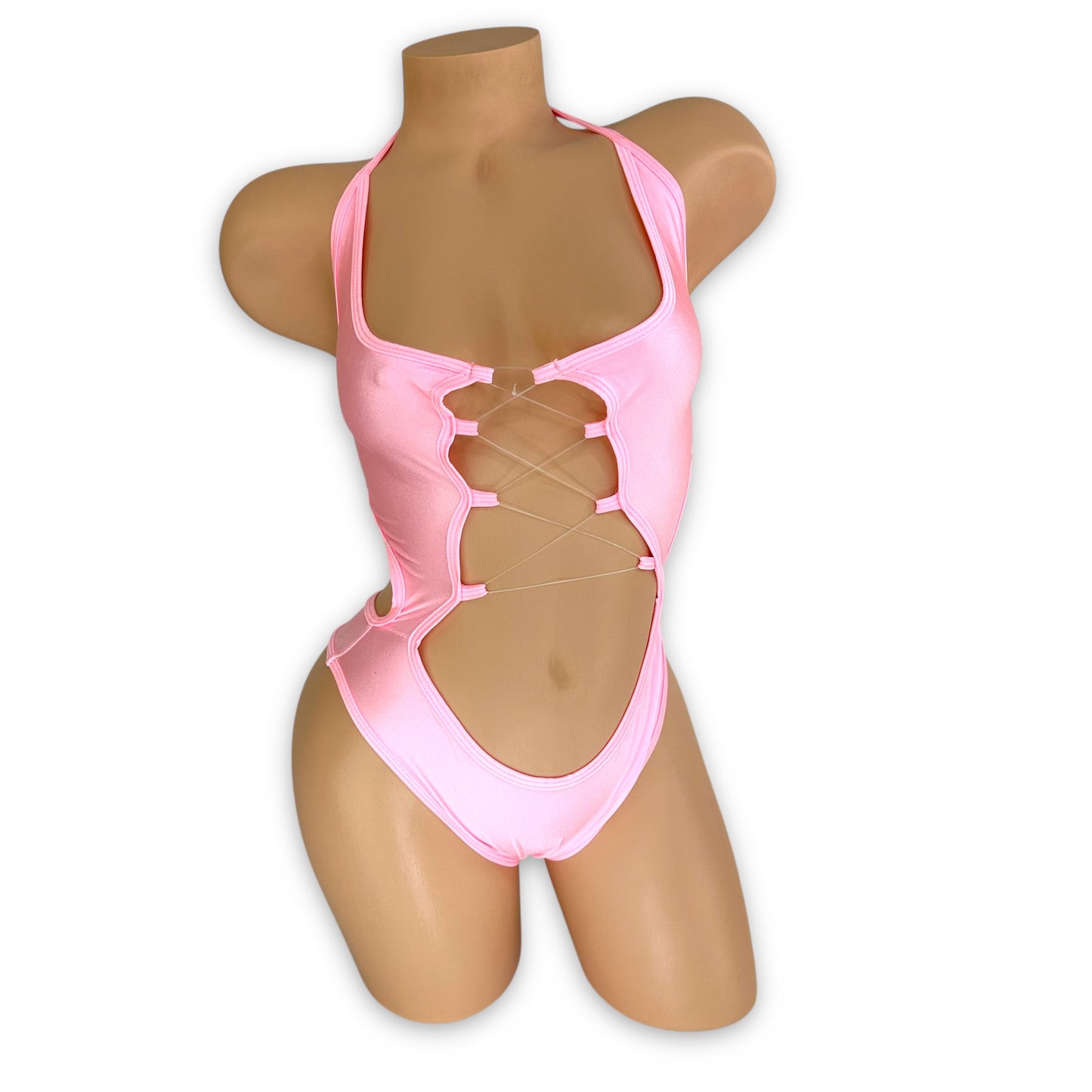 Simone baby pink halter bodysuit with clear elastic lace-up front and side cutouts, front view on mannequin — Golddiggers Boutique exotic dancewear