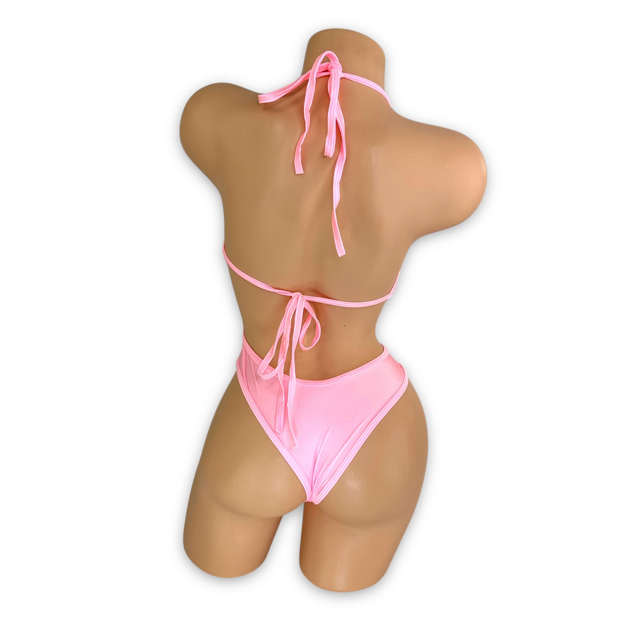 Simone baby pink bodysuit back view showing halter tie and thong bottom — Golddiggers Boutique