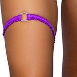Amethyst purple o-ring ruched tip garter worn on the thigh, Golddiggers Boutique