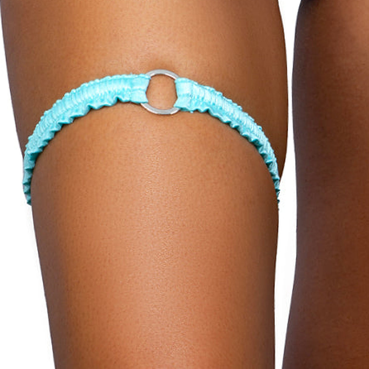 Aquamarine baby blue o-ring ruched tip garter worn on the thigh, Golddiggers Boutique