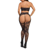 Black lace bodystocking worn by a model on a white background
