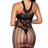 Back view of woman wearing black geometric fishnet minidress with racerback halter design
