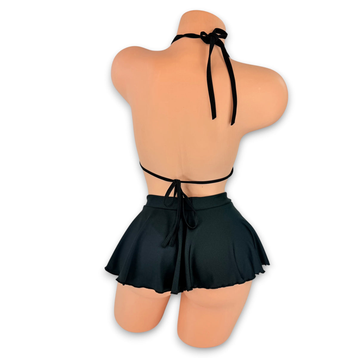 Black Bailey set back view showing neck and back ties and the flare skirt