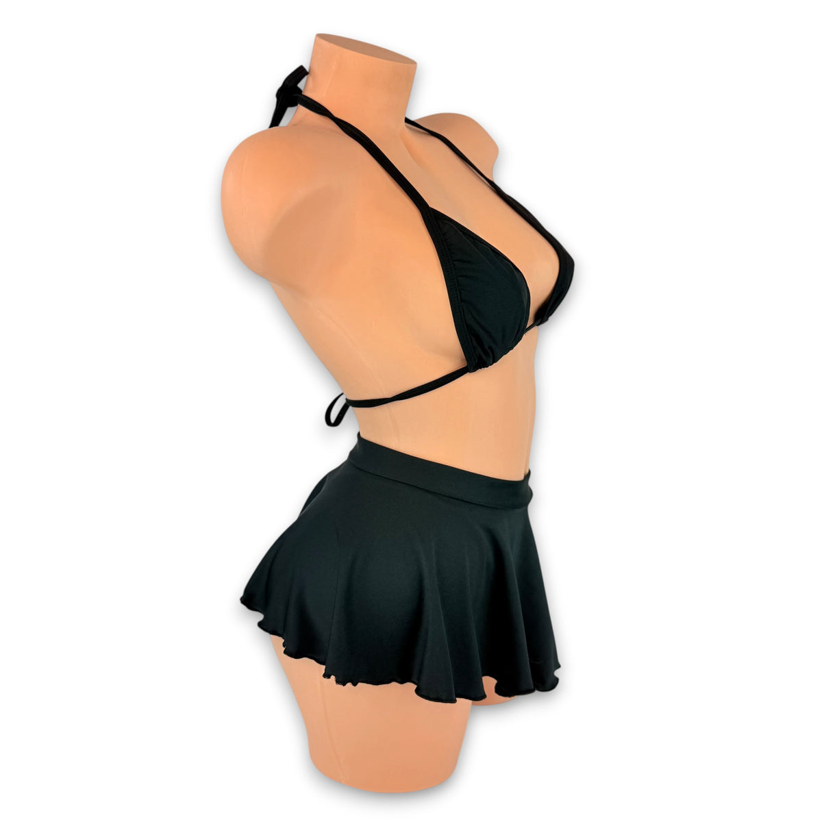 Black Bailey triangle top and high waisted flare skirt, side view