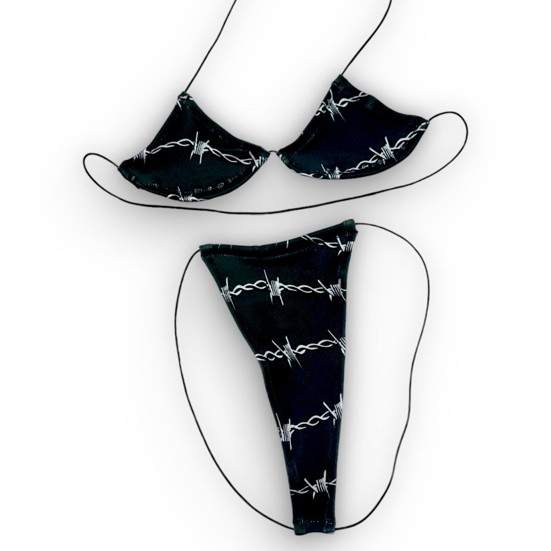 Barbed Wire micro 'kini, flat lay of triangle top and g-string thong on black strings, Golddiggers Boutique