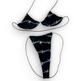 Barbed Wire micro 'kini, flat lay of triangle top and g-string thong on black strings, Golddiggers Boutique