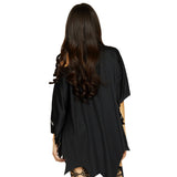 Close-up back view of black glitter spiderweb poncho - Golddiggers Boutique