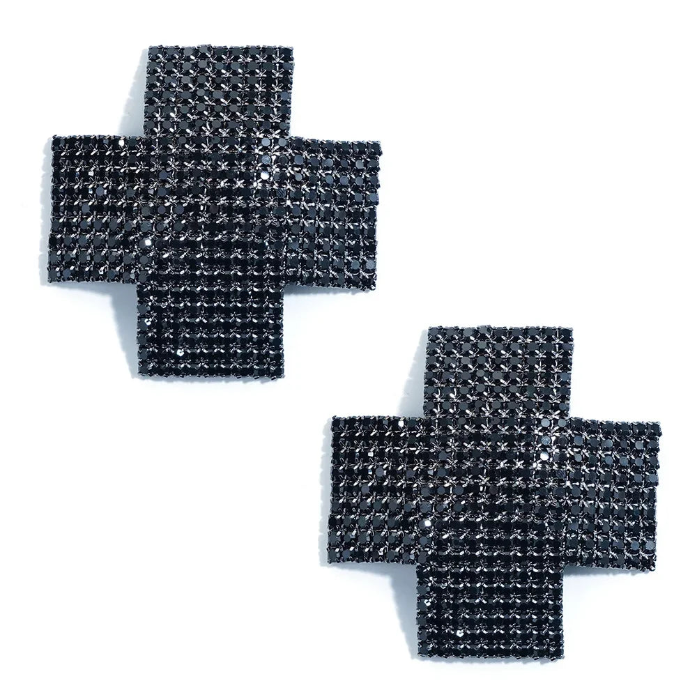Black rhinestone cross pasties angled view showing full crystal coverage, exotic dancewear accessory