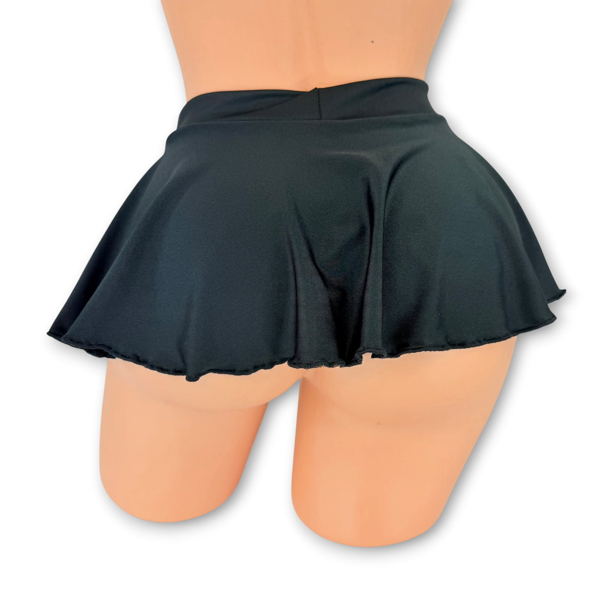 Black flare mini skirt back view showing the full flare and lettuce hem