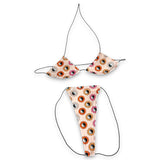 Blush retro daisy yin-yang print micro 'kini with black strings, flat lay on white - Golddiggers Boutique