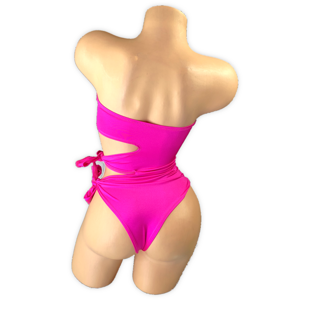 Fuchsia Elodie bodysuit back view showing the strapless back, side cutout and cheeky bottom