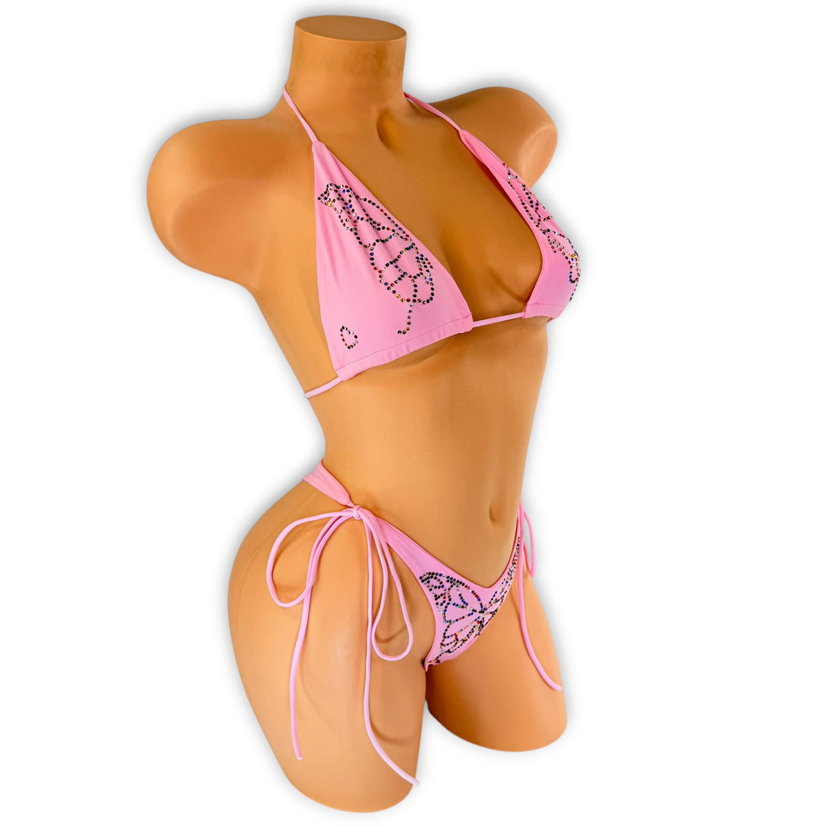 Side view of Gigi pink rhinestone butterfly bikini on mannequin with side ties, exotic dancewear
