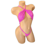 Front of the Hot Pink Zoe vinyl slingshot bodysuit with criss-cross halter straps