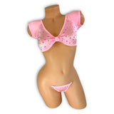 Laurel baby pink rhinestone set, front view with cap-sleeve knot-front crop top and clear elastic g-string
