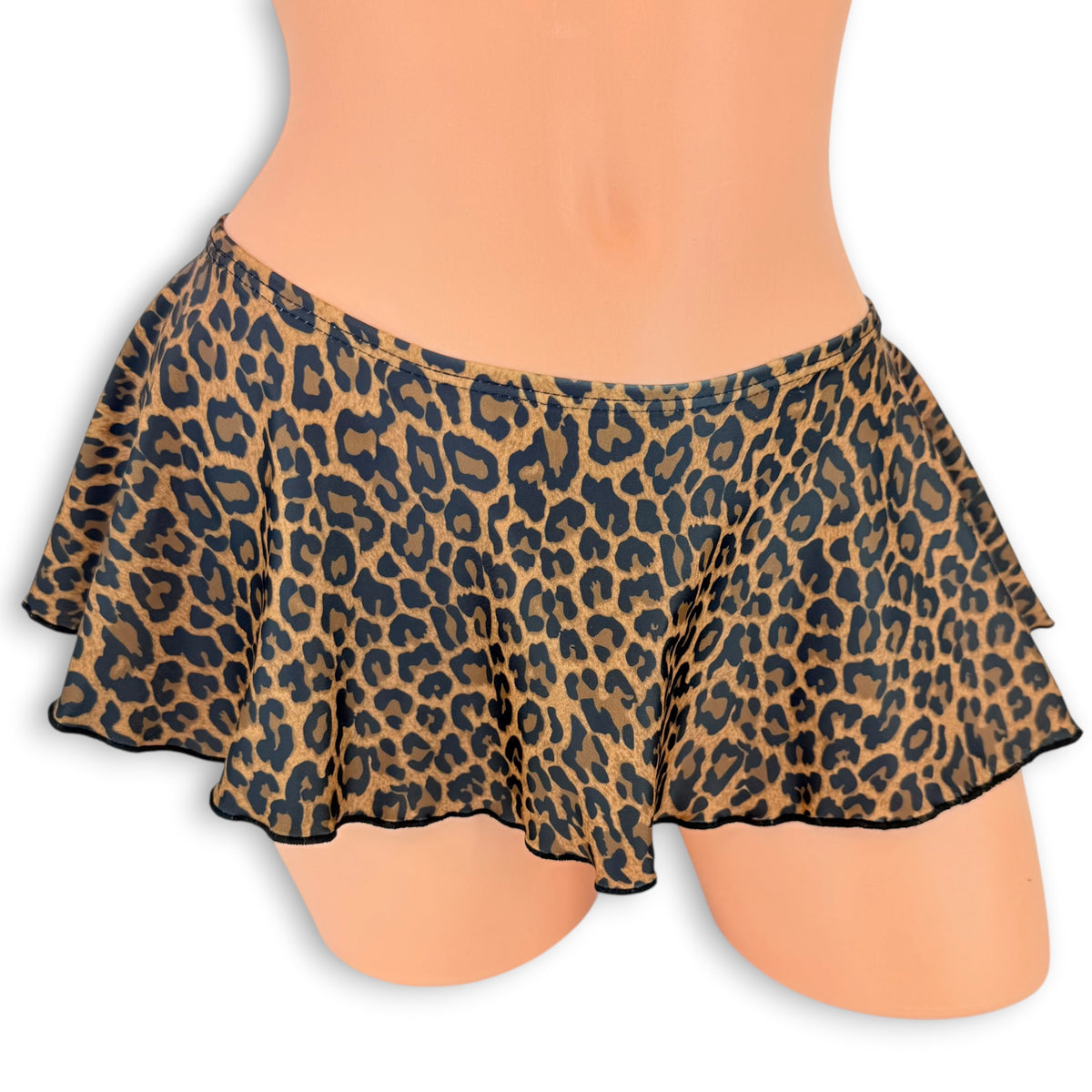 Leopard flare mini skirt with black lettuce hem, front view on mannequin