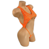 Neon Orange Paige rhinestone cutout slingshot bodysuit, side view on mannequin