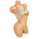 Nude Paige rhinestone cutout slingshot bodysuit, side view on mannequin