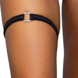 Onyx black o-ring ruched tip garter worn on the thigh, Golddiggers Boutique