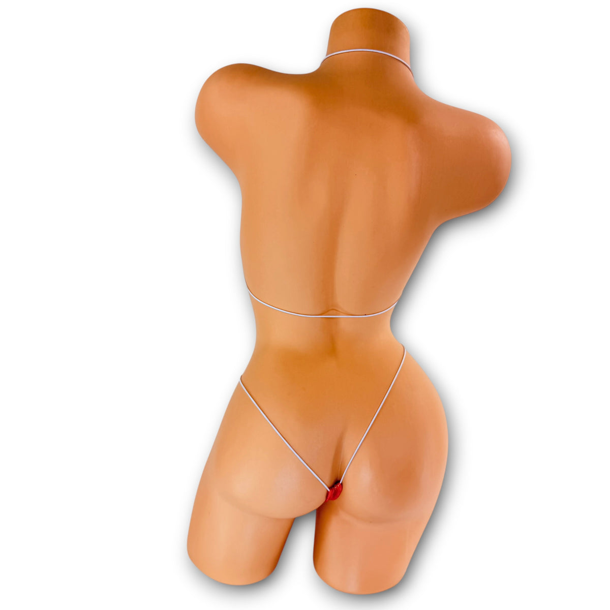 Back view of Orange Holo micro 'kini on mannequin showing white elastic string ties and g-string back