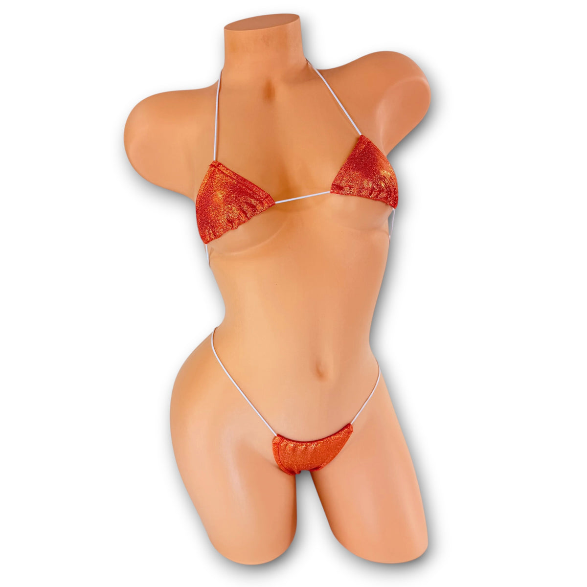 Front view of Orange Holo micro 'kini on mannequin, orange holographic triangle top and g-string on white strings