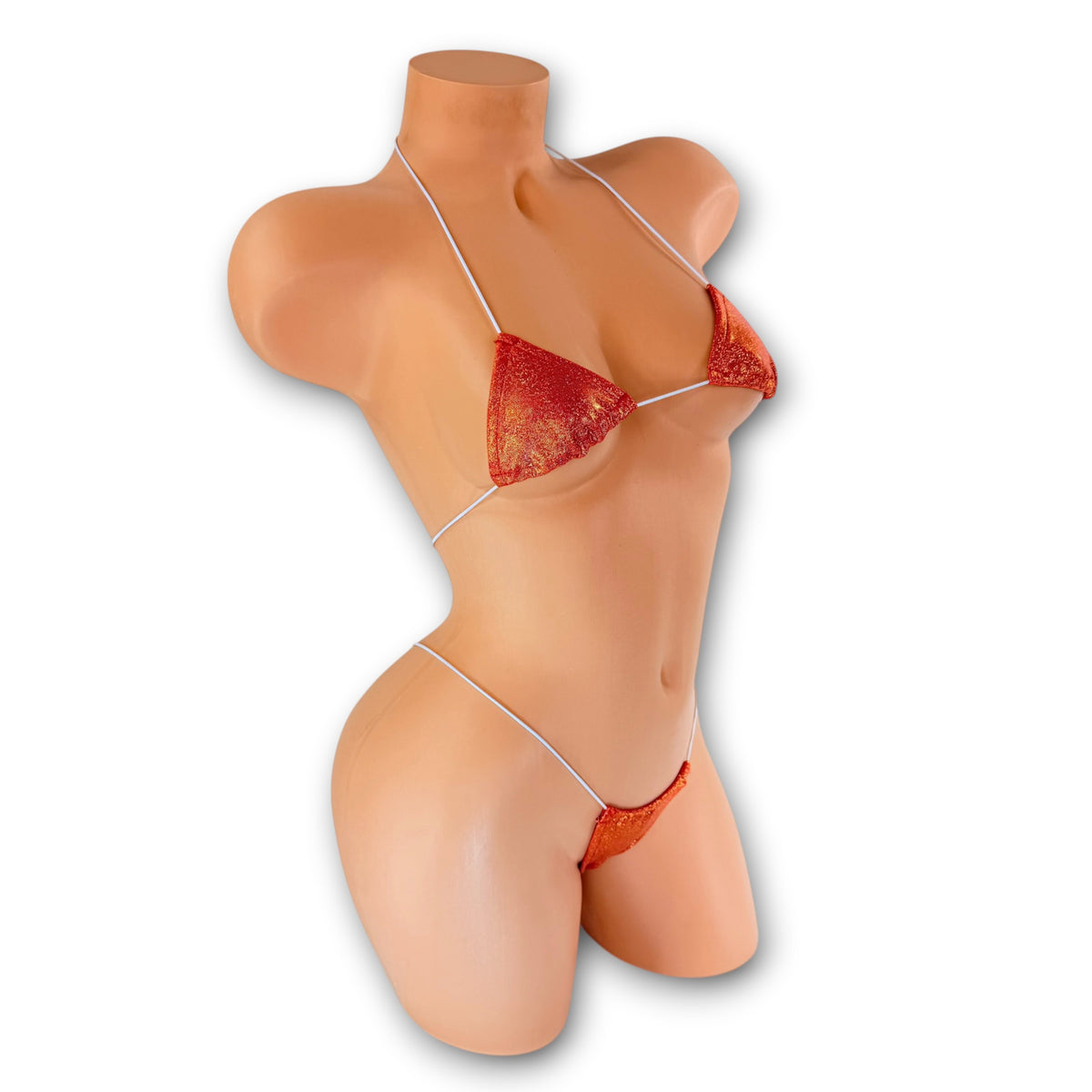 Side view of Orange Holo micro 'kini on mannequin, sparkling orange holographic exotic dancewear