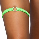 Peridot neon green o-ring ruched tip garter worn on the thigh, Golddiggers Boutique