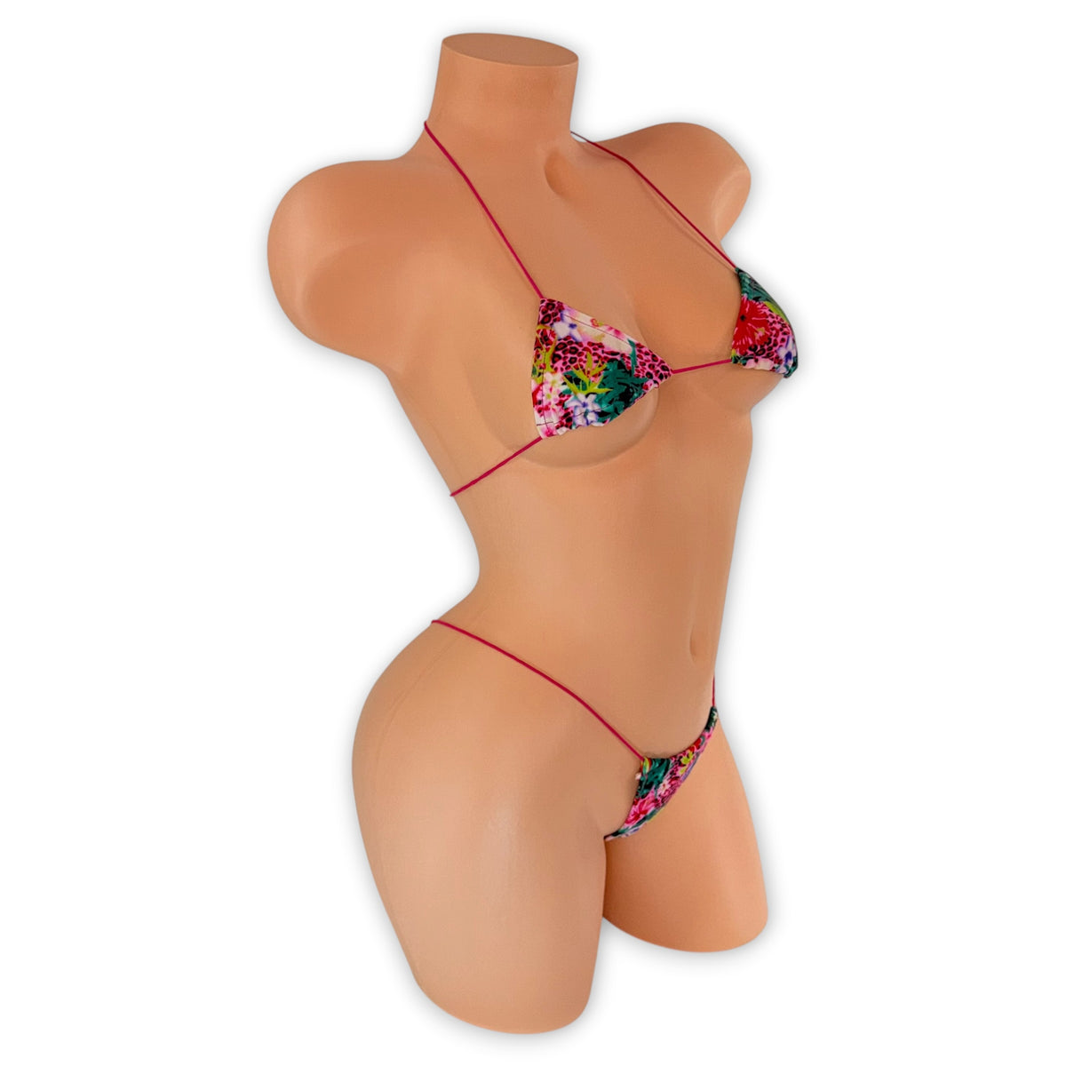 Side view of Pink Leopard Tropical micro 'kini on mannequin, pink leopard and tropical floral exotic dancewear