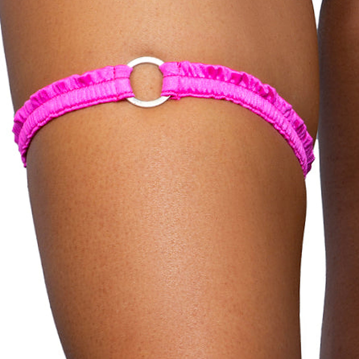 Pink Sapphire fuchsia o-ring ruched tip garter worn on the thigh, Golddiggers Boutique