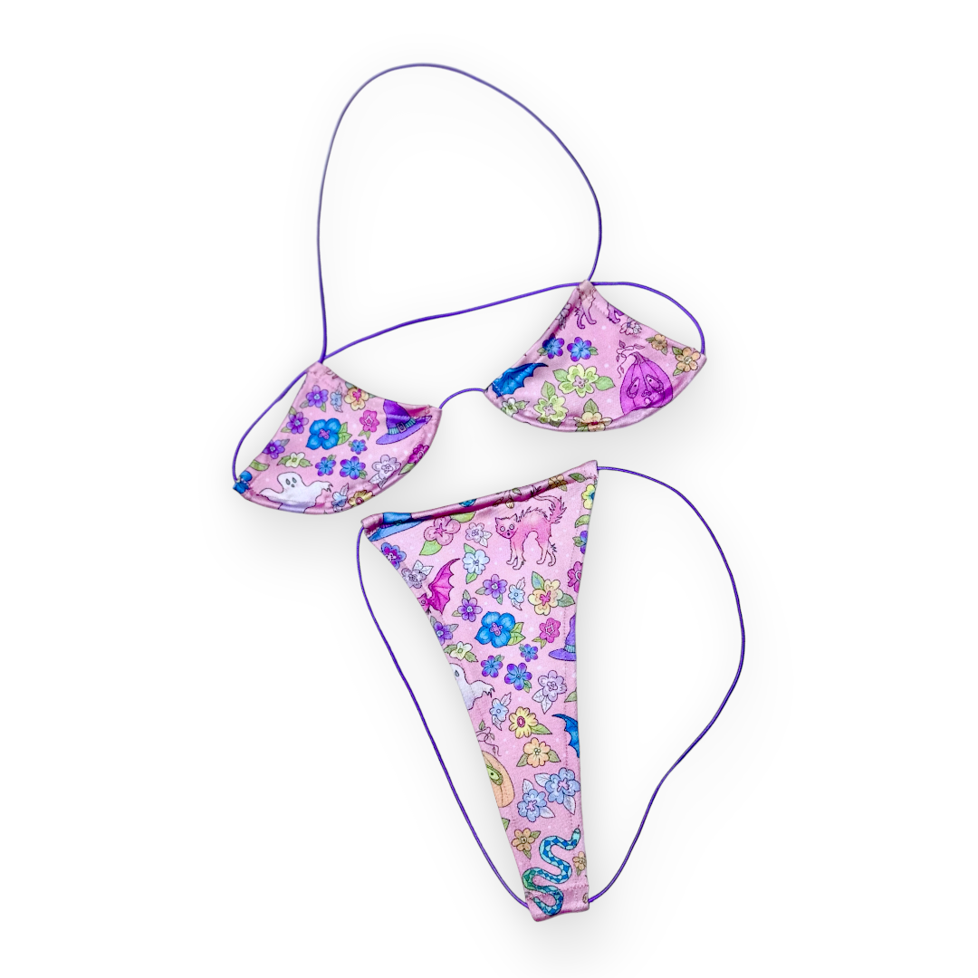 Spooky Pastel micro 'kini, flat lay of triangle top and g-string thong on lilac strings, Golddiggers Boutique