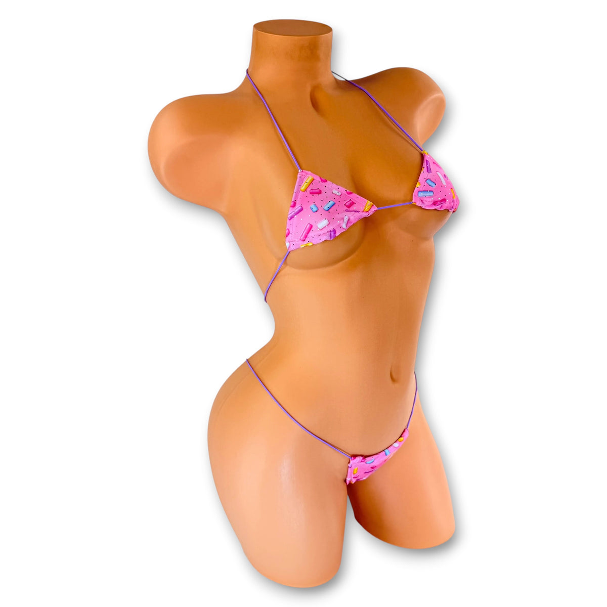 Side view of Pink Sprinkles micro 'kini on mannequin, bubble gum pink sprinkle print exotic dancewear