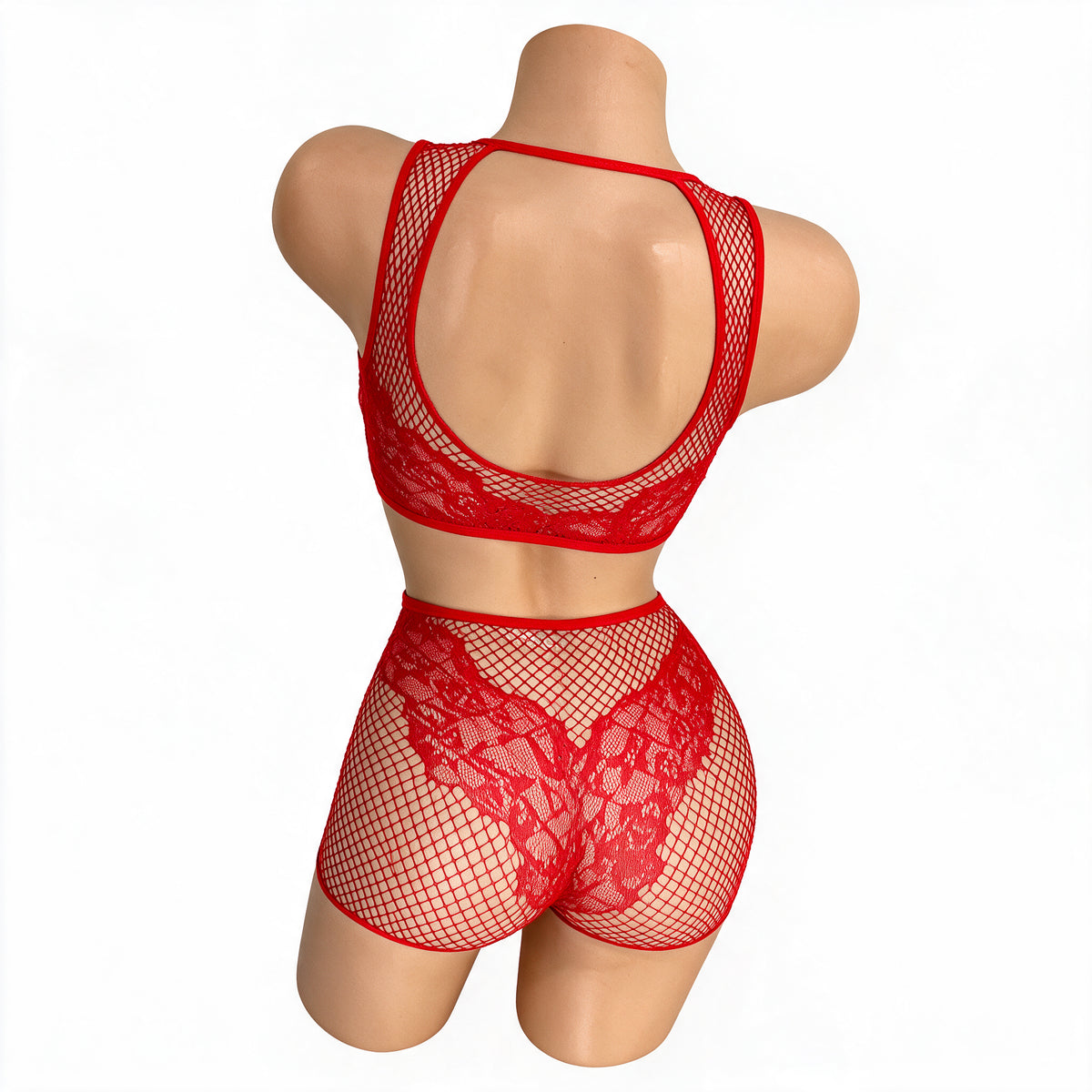 Back view of the Red Carmen fishnet and lace crop top with open racerback and lace boy shorts on a mannequin - Golddiggers Boutique
