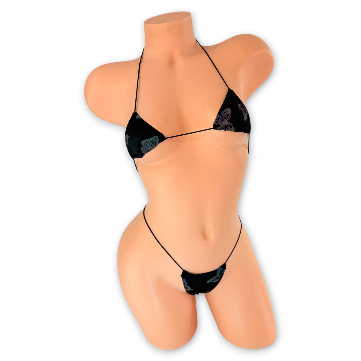 Black reflective butterfly micro bikini on mannequin, front view in regular light - Golddiggers Boutique