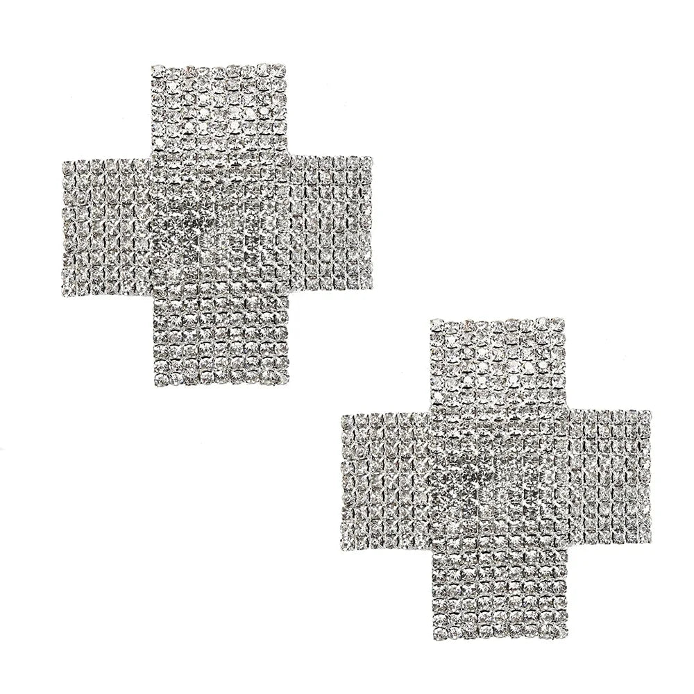 Silver rhinestone cross pasties angled view showing full crystal coverage, exotic dancewear accessory