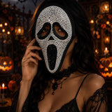 Silver rhinestone screaming skull mask worn with black lace, close-up - Golddiggers Boutique