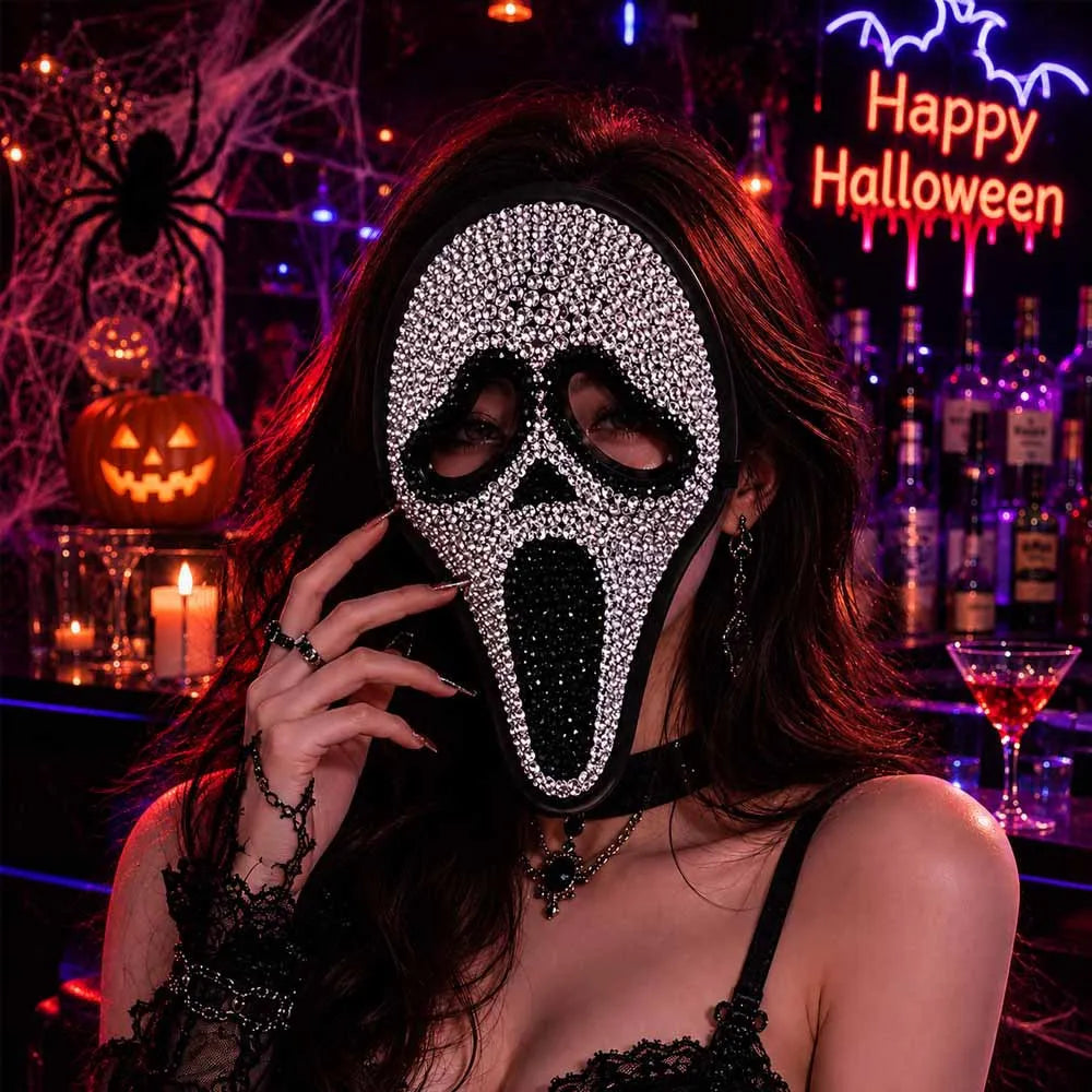 Silver rhinestone screaming skull mask worn at a Halloween bar - Golddiggers Boutique