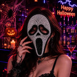 Silver rhinestone screaming skull mask worn at a Halloween bar - Golddiggers Boutique