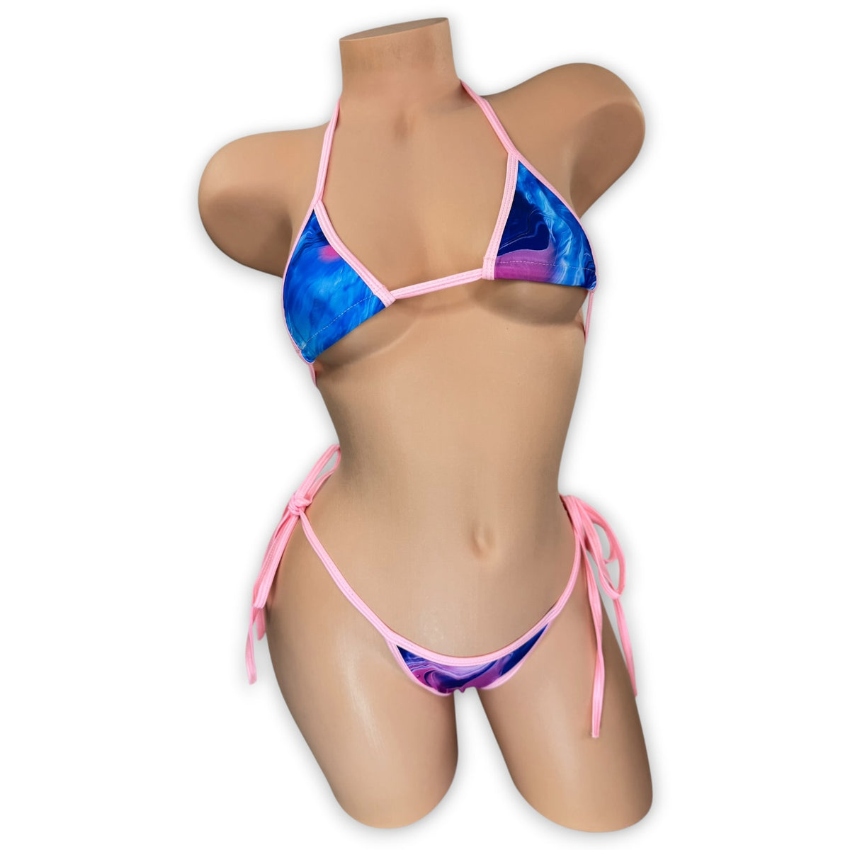Smoked Maggie tie-side 'kini in pink, blue, and purple smoke print with baby pink trim, front view - Golddiggers Boutique