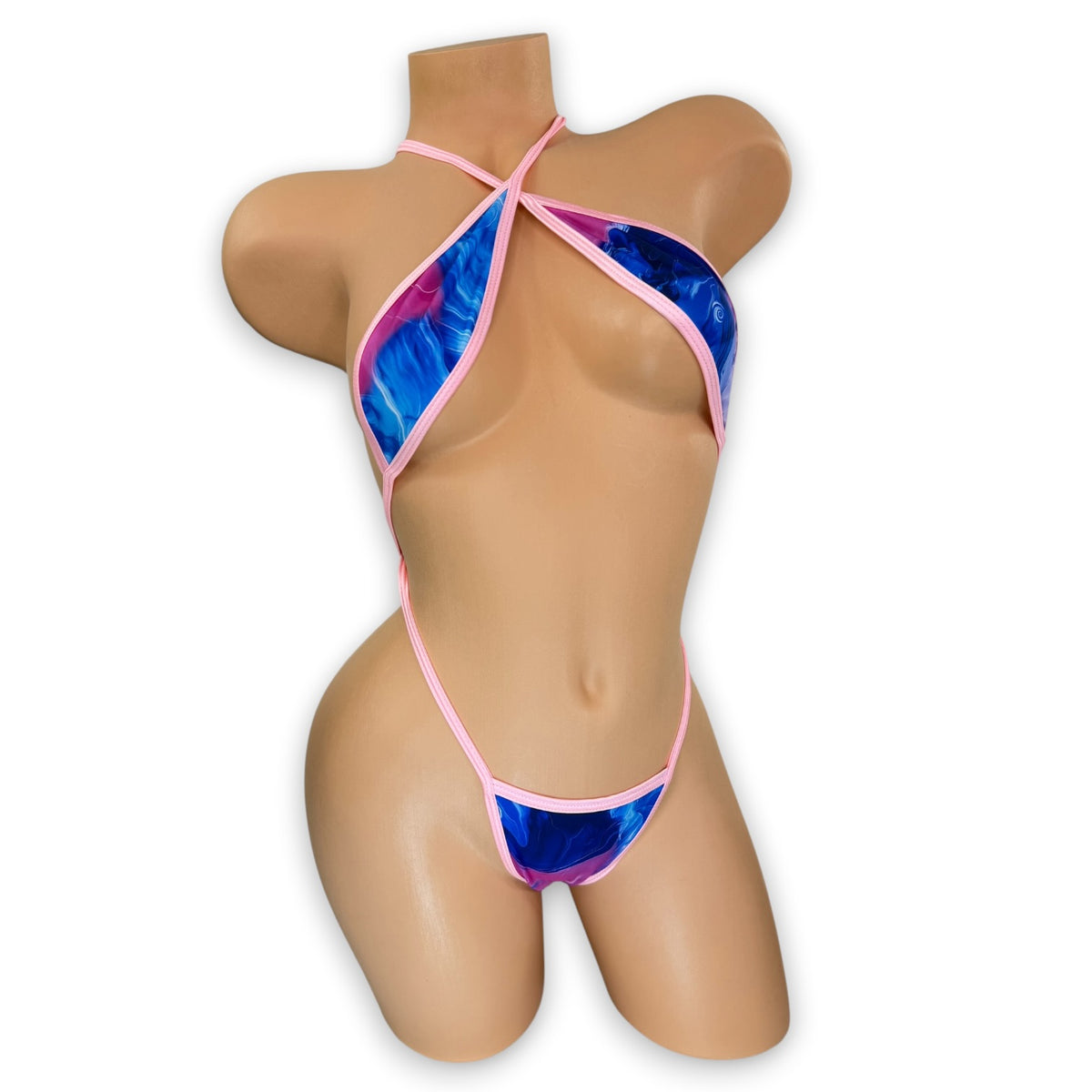 Smoked pink, blue, and purple slingshot bodysuit with baby pink trim on mannequin, front view - Golddiggers Boutique