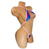Smoked slingshot bodysuit with baby pink trim on mannequin, side view - Golddiggers Boutique