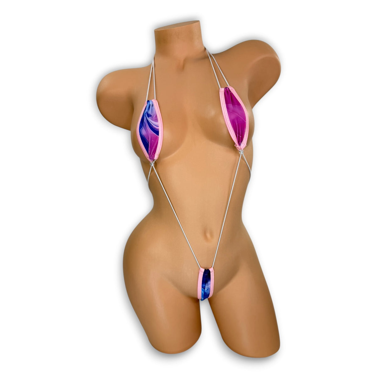 Smoked teeny tiny slingshot bodysuit in pink, blue, and purple smoke print on mannequin, front view - Golddiggers Boutique