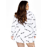 Close-up back view of white & black stitch print jersey dress costume in plus size - Golddiggers Boutique