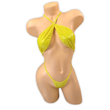 Front of the Yellow Zoe vinyl slingshot bodysuit with criss-cross halter straps