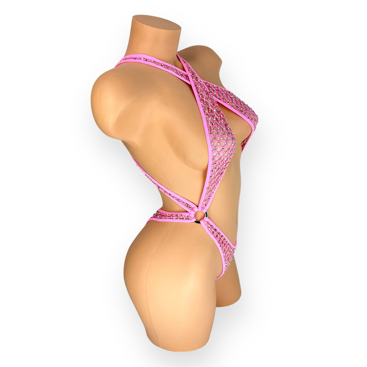 Bubble gum pink Ann criss-cross bodysuit, side view showing o-ring hip detail - Golddiggers Boutique