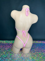Bubble gum pink Katie 'kini, back view of ties and g-string on dark background with holographic floor - Golddiggers Boutique