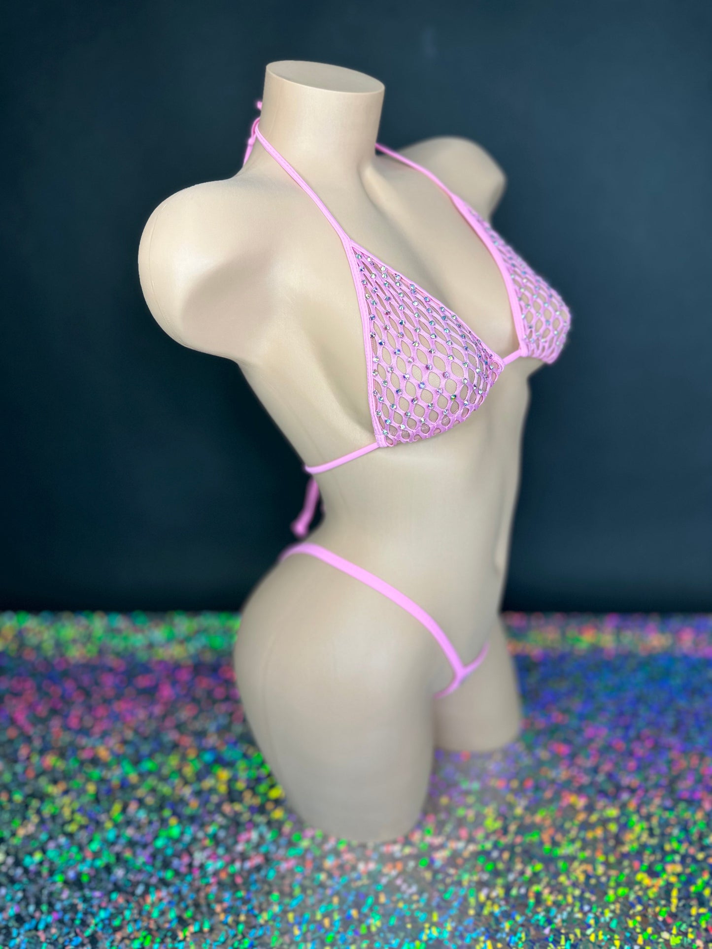 Bubble gum pink Katie rhinestone 'kini, side view on dark background - Golddiggers Boutique