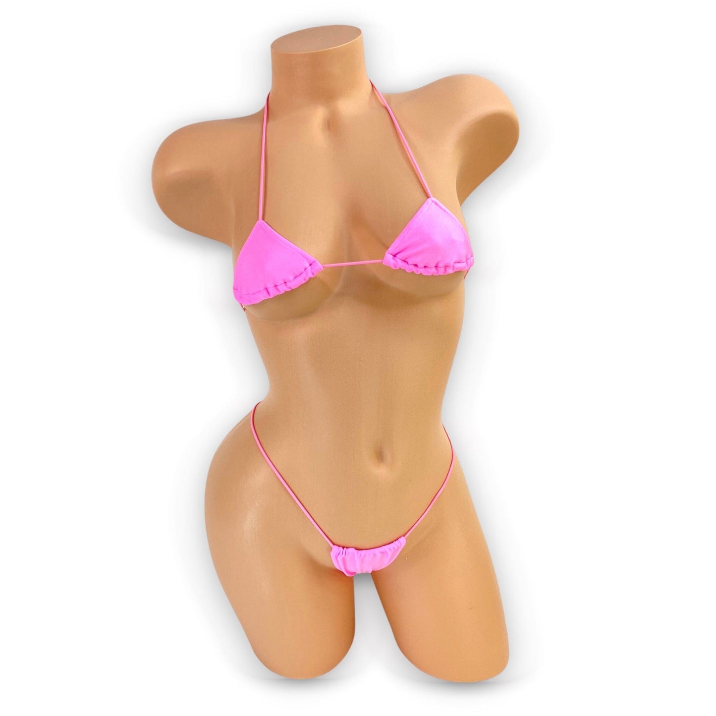 Bubble gum pink teeny tiny micro kini with triangle top and elastic straps, front view on mannequin — Golddiggers Boutique exotic dancewear
