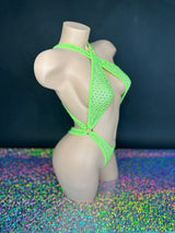 Lime green Ann criss-cross bodysuit, side view on dark background - Golddiggers Boutique