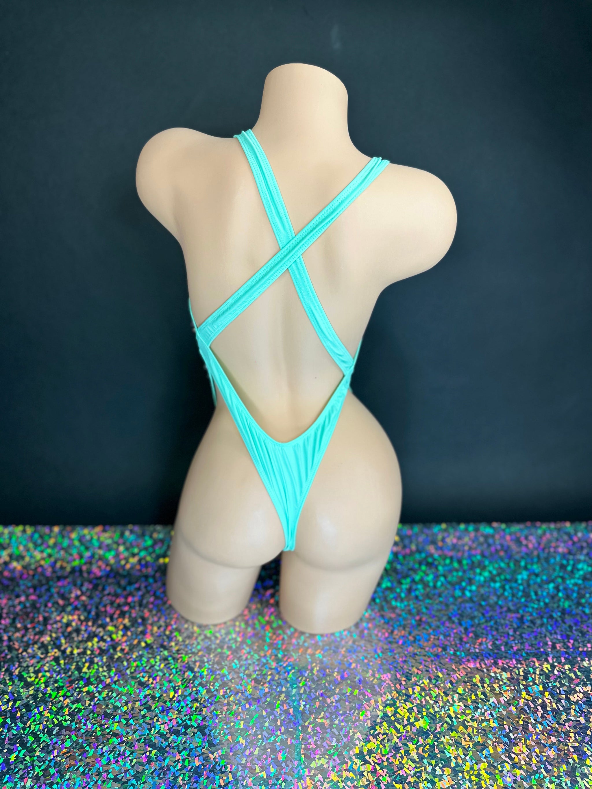 Ashley mint rhinestoned bodysuit stretchy fabric fit, side angle — Golddiggers Boutique exotic dancewear