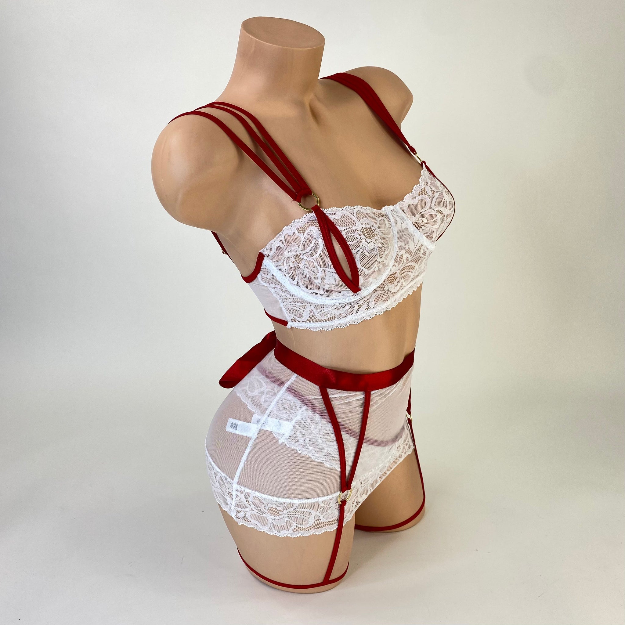 Complete nurse Halloween costume set laid flat with all pieces, flat lay — Golddiggers Boutique exotic dancewear
